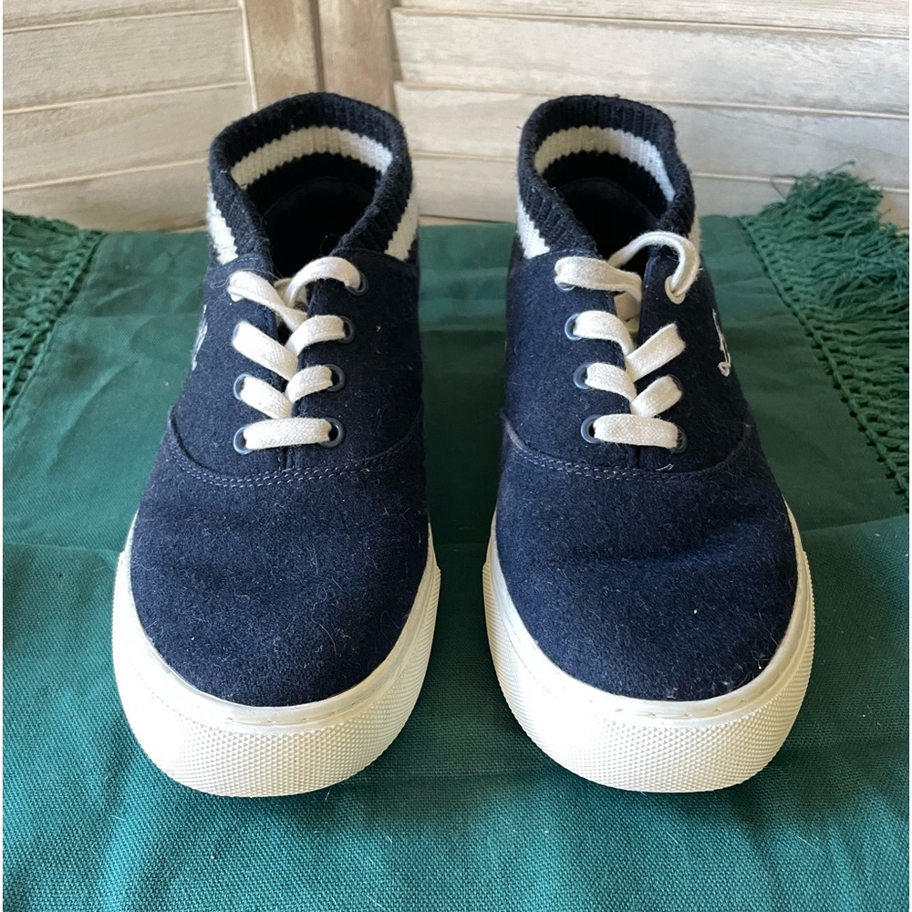 “Love All” mid top Tory Sport by Tory Burch sneakers.